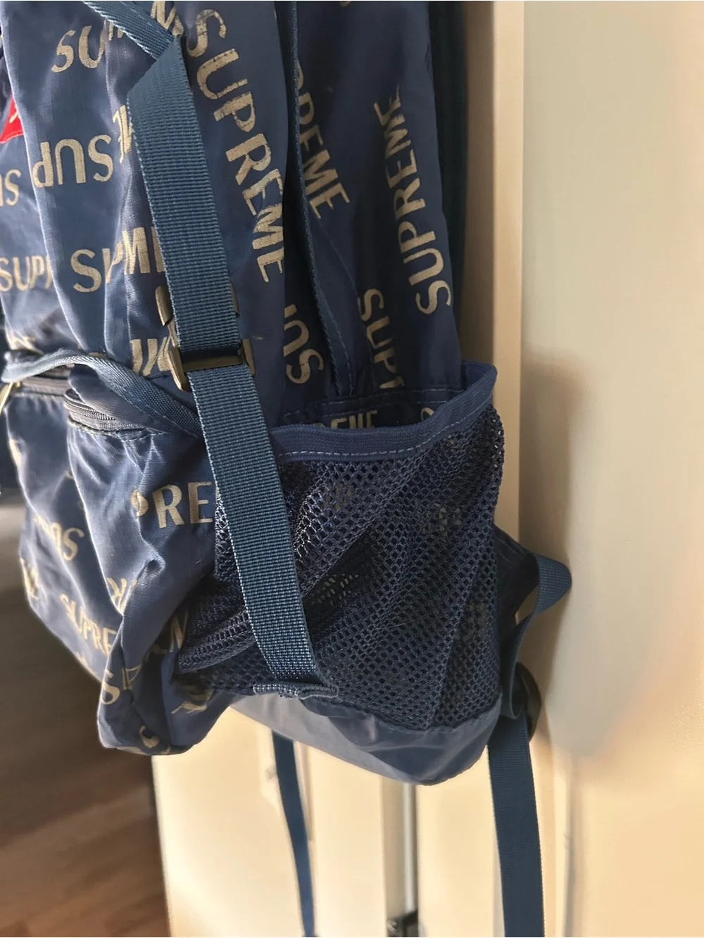 Supreme Navy All-Over Logo Backpack with Red Patch